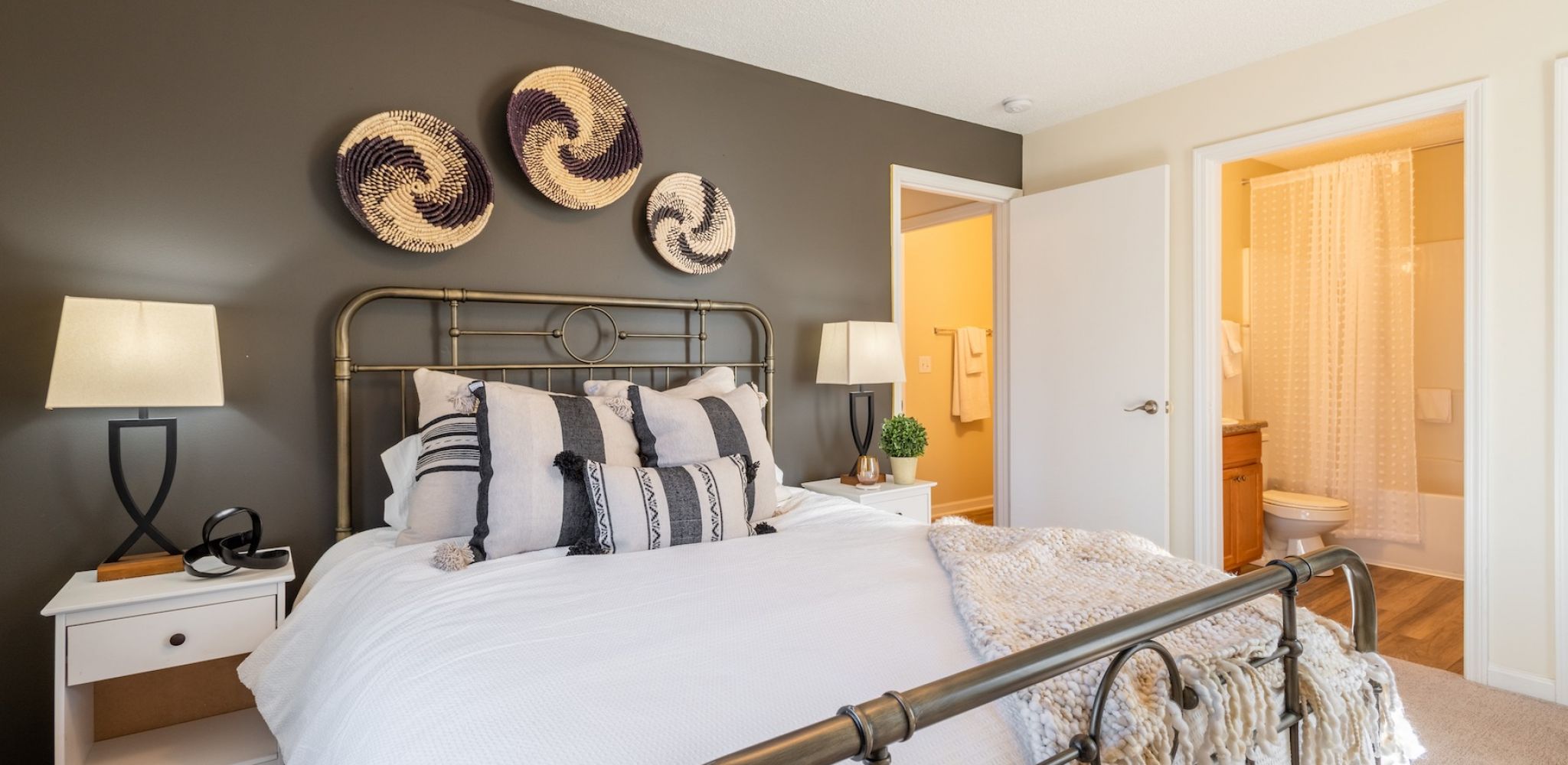 Hawthorne at the Hall spacious apartment bedroom furnished with large bed and on suite bathroom