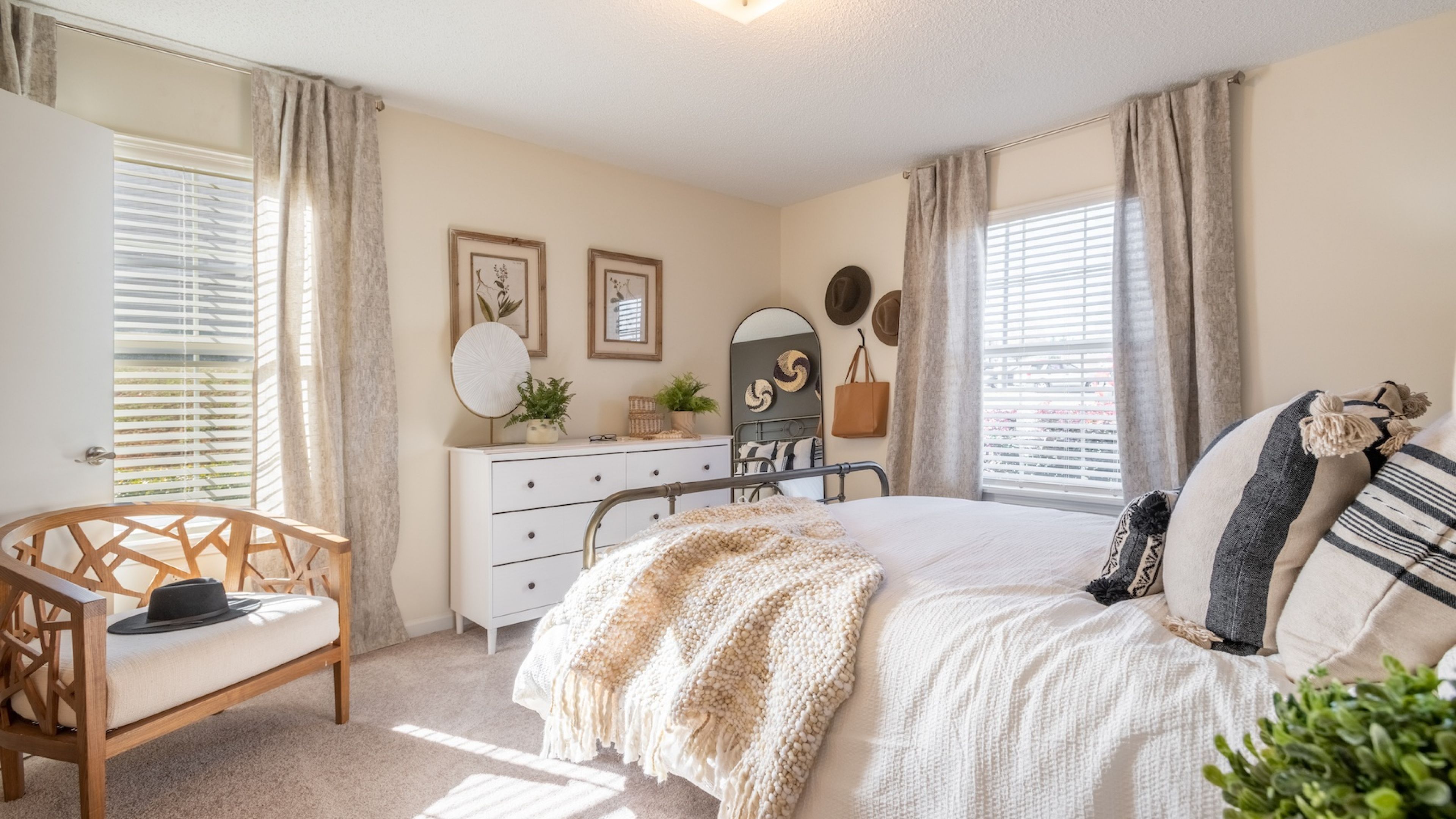 Hawthorne at the Hall spacious apartment bedroom with carpet and large windows